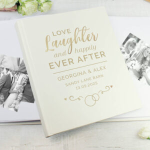 Personalised 'Happily Ever After' photo album in cream and gold with custom names and wedding date, suitable for a wedding gift.