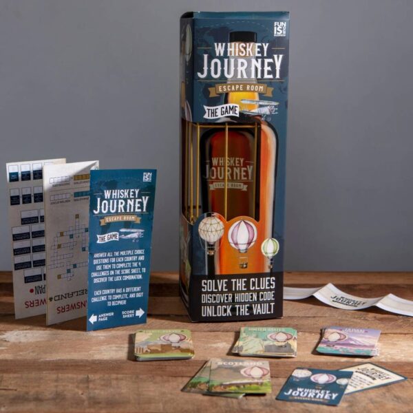 Whisky Journey Escape Room Game box with a gold cage, instructions, score sheet and country question cards