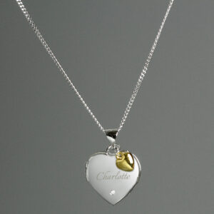 Personalised sterling silver heart locket necklace featuring an engraved name, a small inset diamond, and a 9ct gold heart charm on a silver curb chain.