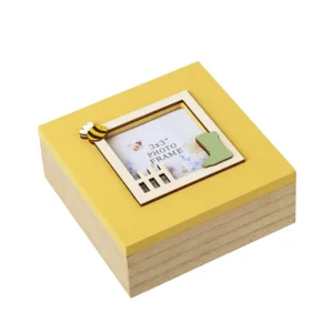 ellow photo frame memory box by Heaven Sends featuring a natural wood base, a yellow lid with a 3x3 inch photo window, and 3D bee and wellington boot decorations.