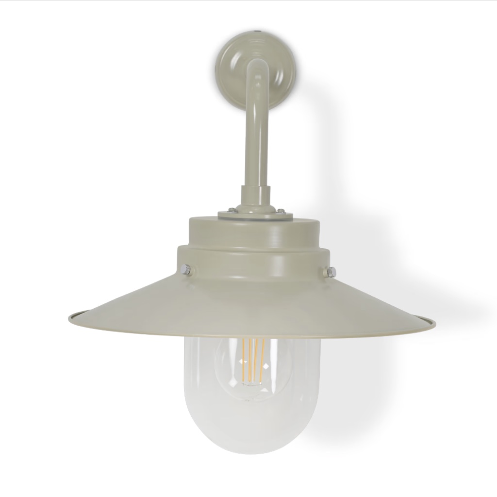Front view of the HMS Belfast inspired nautical wall light in gloss Clay with a visible filament LED bulb.